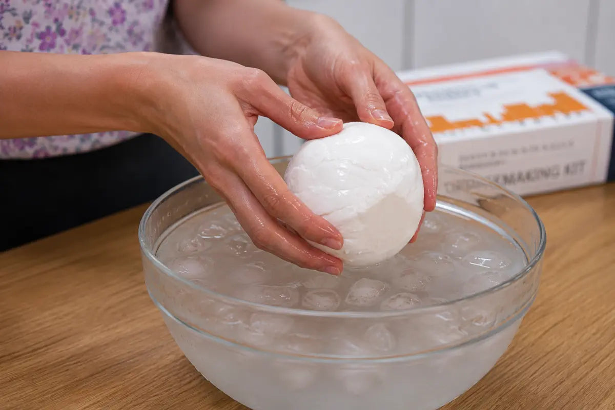 Mozzarella cooling in ice water