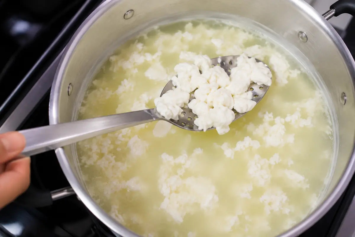 Curds reheating in whey